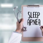Clipboard that says sleep apnea, sleep apnea and oral health, oral appliance
