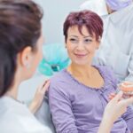 dental implants, dentures, dental implants vs dentures, implant-supported dentures, bone loss, tooth replacement, Alma Dental Care, Petaluma