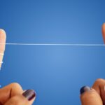 should you floss before or after brushing