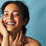 smiling woman with dental bonding on front teeth