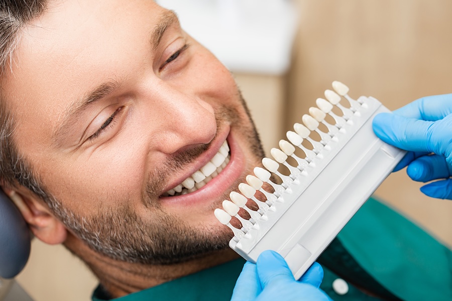 dental veneers consultation, porcelain veneers, man at dentist for veneers asking will my veneers look fake
