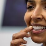 woman with sensitivity after dental veneers sensitive veneers