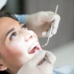 woman at dentist for dental cleaning